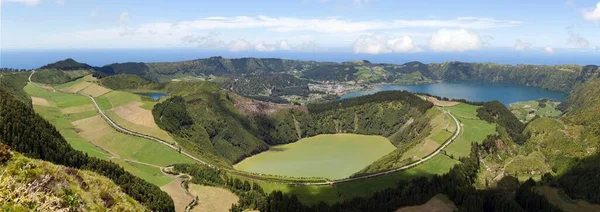 Panorama, view of the volcanic crater Caldeira das Sete Cidades, in front of the volcanic lake Lagoa de Santiago, in the back on the right the volcanic lake Lagoa Azul, island Sao Miguel, Azores, Portugal, Europe