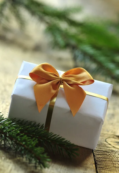 Gift in the package with ribbon — Stock Photo, Image