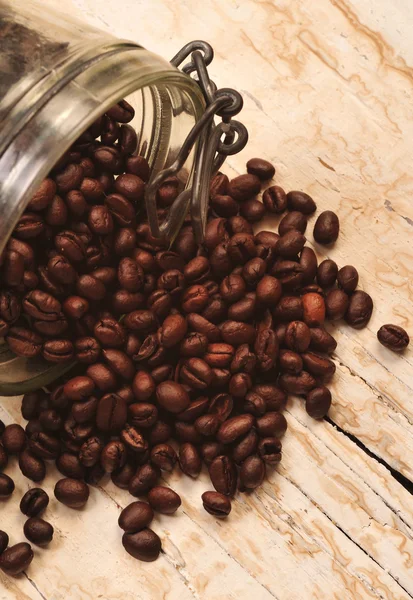 Grano de café en frasco —  Fotos de Stock