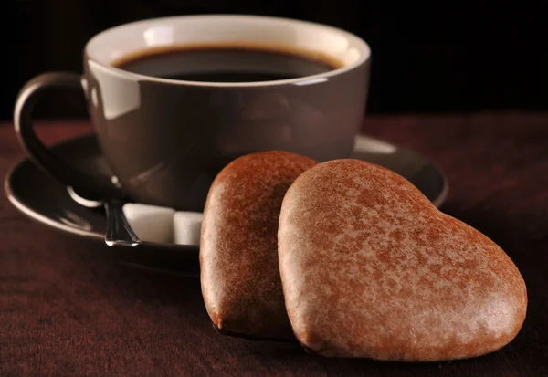 Lebkuchen und braune Kaffeetasse — Stockfoto