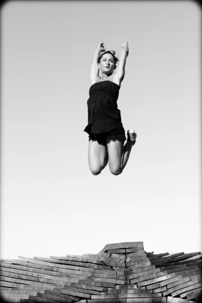 Bailarina saltando. Stockfoto