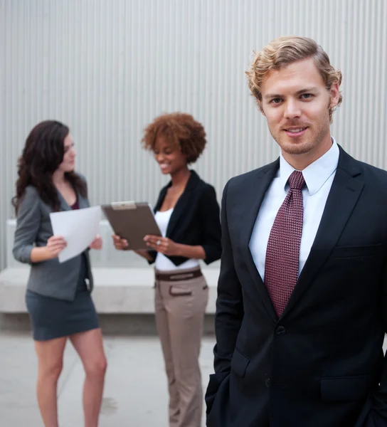 Attractive young business group standing together at office — Stock Photo, Image