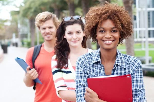 Happy group of college students Stock Photo