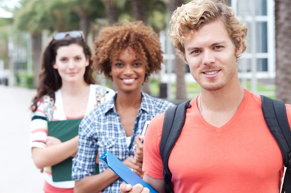 Happy group of college students Stock Picture