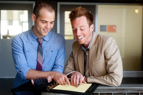 Portrait of two young handsome businessmen — Stock Photo, Image