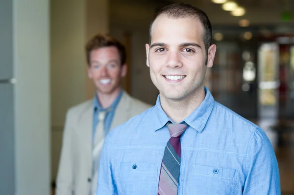 Portrait of two young handsome businessmen — Stock Photo, Image