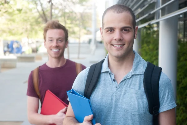 Pair of happy young male students — Stock Photo, Image