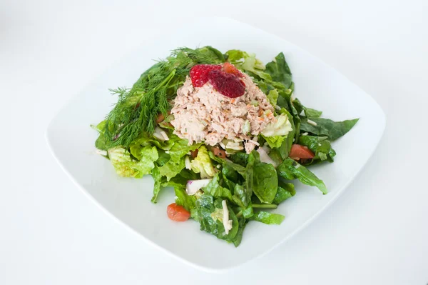 Fresh chopped tuna salad topped with strawberries — Stock Photo, Image