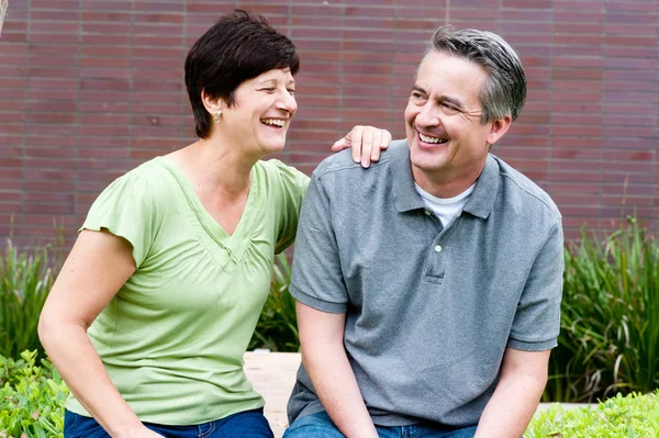 Happy elderly seniors couple in park — Stock Photo, Image