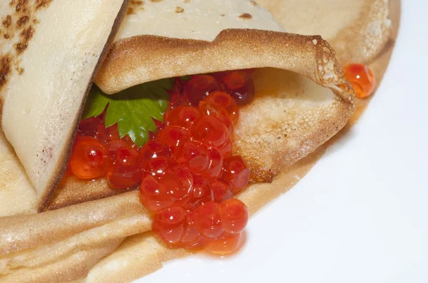 Pancake roll with red caviar — Stock Photo, Image