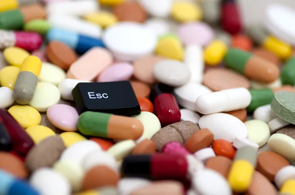 Esc key among drugs (escape from drugs) — Stock Photo, Image