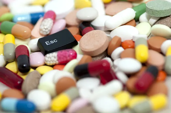 Esc key among drugs (escape from drugs) — Stock Photo, Image