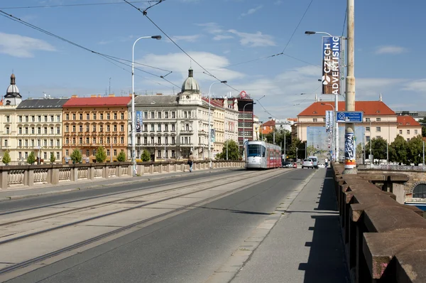 Prague cityscape with old buildings and modern tram — Stock Photo, Image