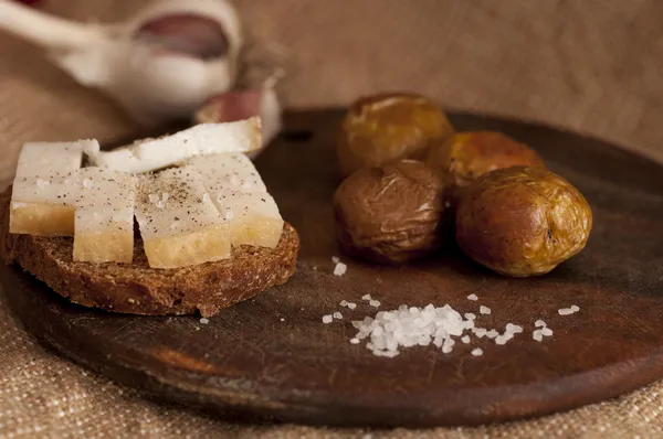 Sandwich with salted lard and baked potatoes — Stock Photo, Image