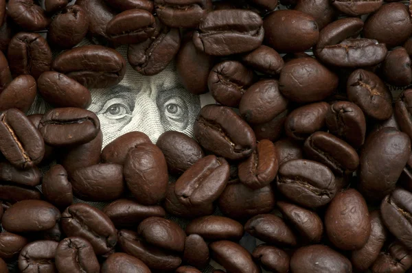 Coffee beans on bank note — Stock Photo, Image