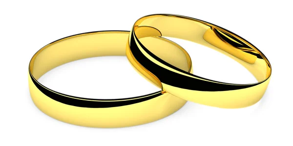 Dois anéis de casamento dourados mentirosos — Fotografia de Stock
