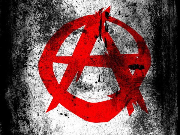 Anarchie symbool geschilderd op wit oppervlak met grungy vuile vlekken op het — Stockfoto