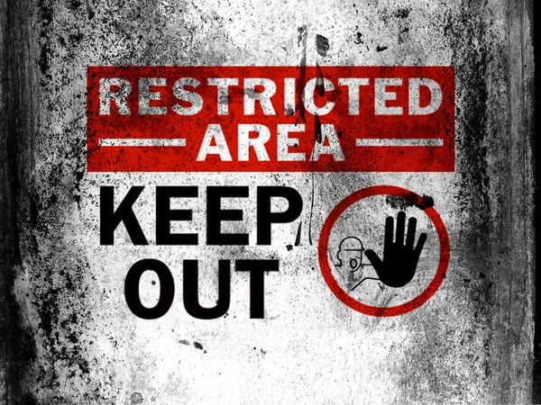 Restricted area sign painted on board with grungy dirty stains all over it — Stock Photo, Image