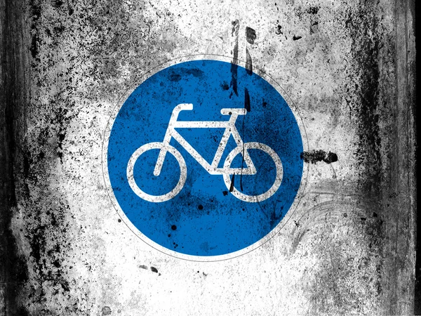Panneau de signalisation de vélo peint à bord avec des taches sales grungy partout — Photo