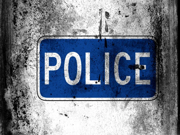Politie verkeersbord geschilderd aan boord met grungy vuile vlekken over het — Stockfoto