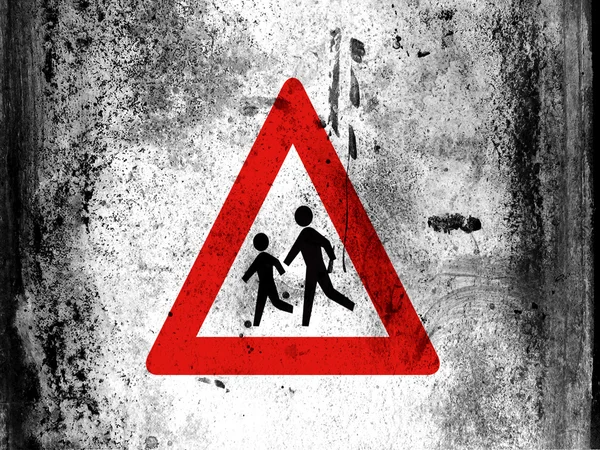 School road sign painted on board with grungy dirty stains all over it