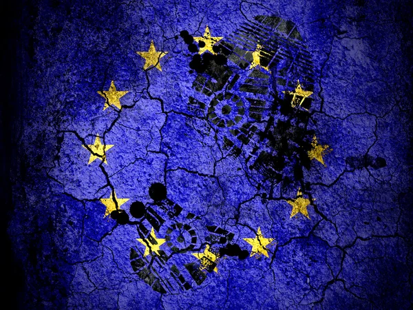 Europe Union flag painted on cracked ground with vignette with dirty oil footprint over it