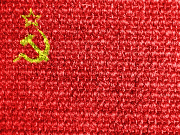 Bandeira da URSS pintada sobre tecido cinzento — Fotografia de Stock