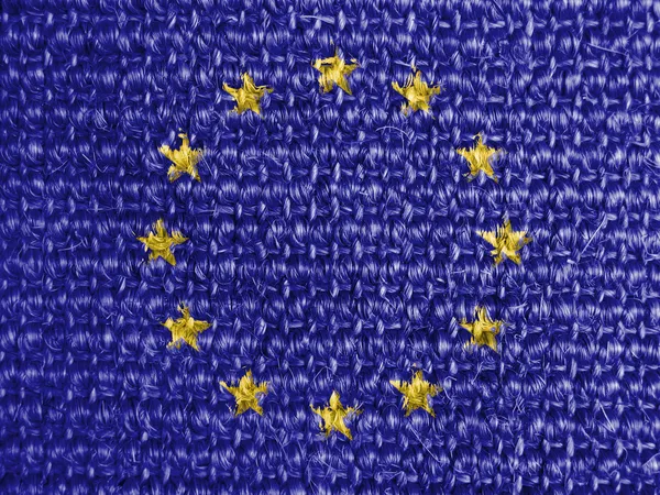 Bandera de la Unión Europea pintada sobre tela gris — Foto de Stock