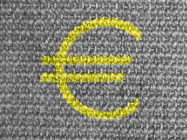 Euro currency sign painted on grey fabric — Stock Photo, Image