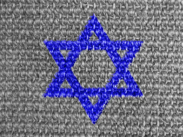 Jewish star painted on grey fabric — Stock Photo, Image