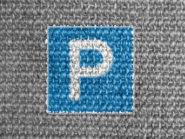Parking road sign painted on grey fabric — Stock Photo, Image
