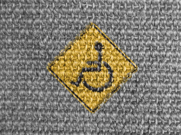 Wyłączone znak drogowy pomalowane na szara tkanina — Zdjęcie stockowe