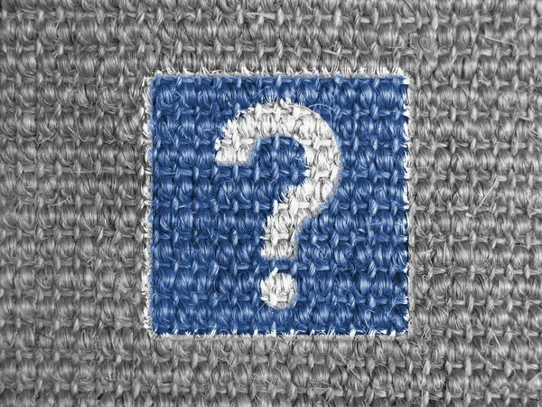 Question road sign painted on grey fabric — Stock Photo, Image