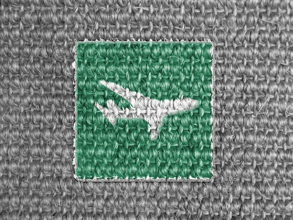 Panneau routier avion peint sur tissu gris — Photo