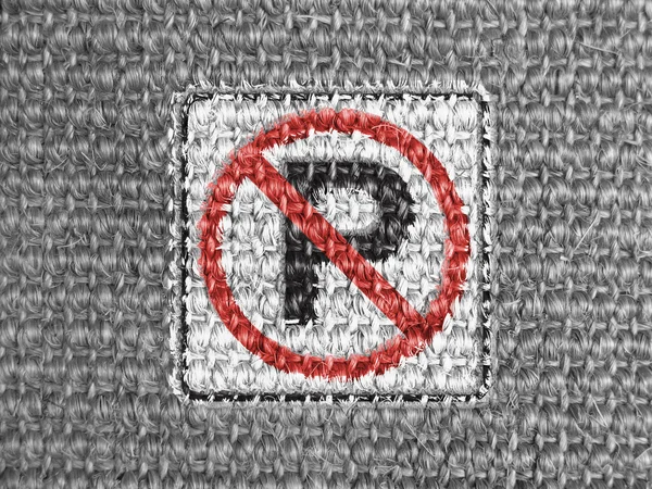 No parking road sign painted on grey fabric — Stock Photo, Image