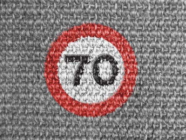 Speed limit sign painted on grey fabric — Stock Photo, Image