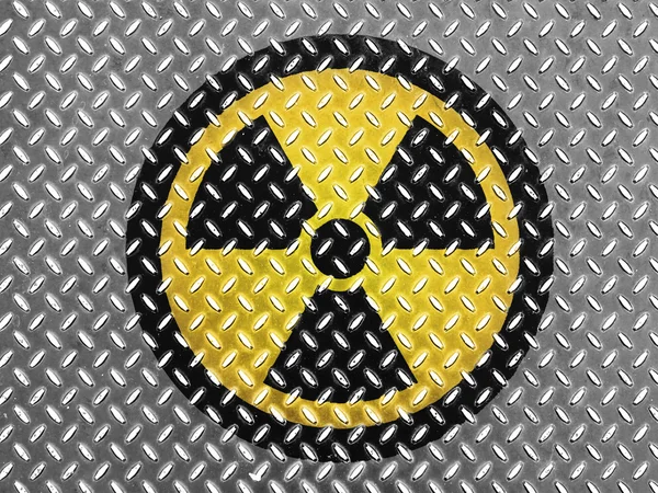 Nuclear radiation symbol painted on metal floor — Stock Photo, Image