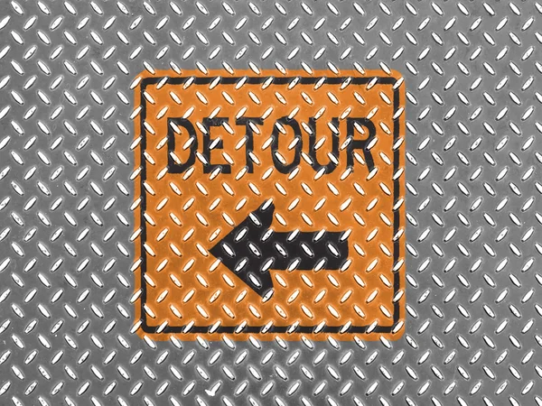 Detour road sign painted on metal floor — Stock Photo, Image