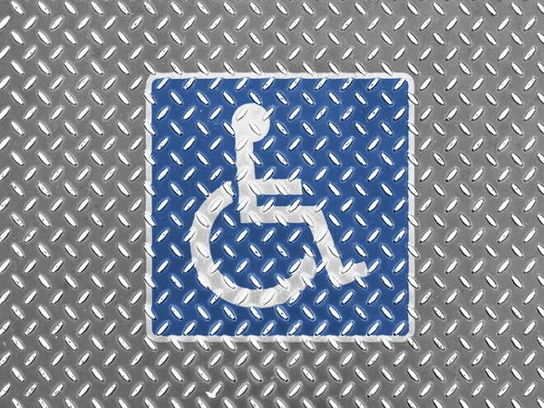 Disabled road sign painted on metal floor — Stockfoto