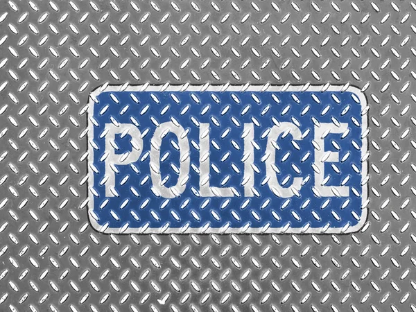 Politie verkeersbord geschilderd op de metalen vloer — Stockfoto