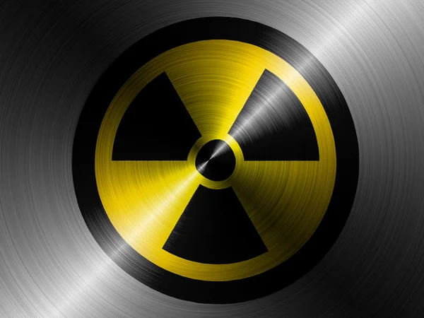 Nuclear radiation symbol painted on brushed metall — Stock Photo, Image