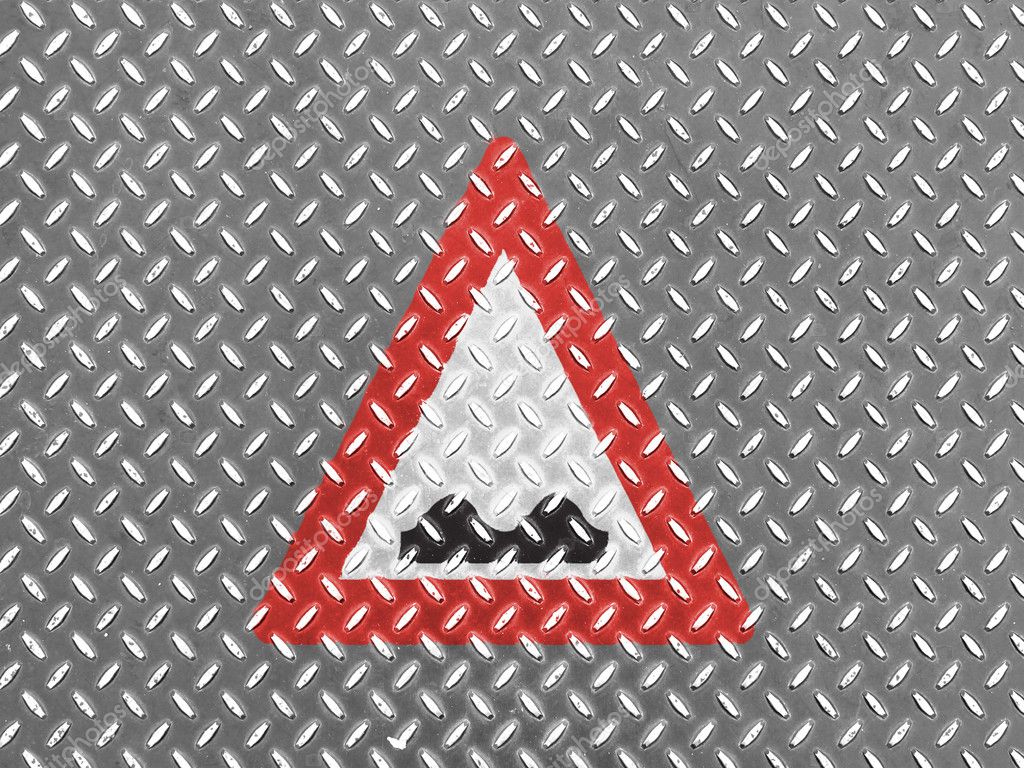 Uneven Road Sign Painted On Metal Floor Stock Photo C Olesha