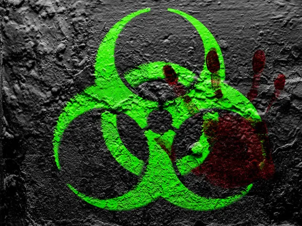 Biohazard sign painted on grunge wall with bloody palmprint over it — Stock Photo, Image