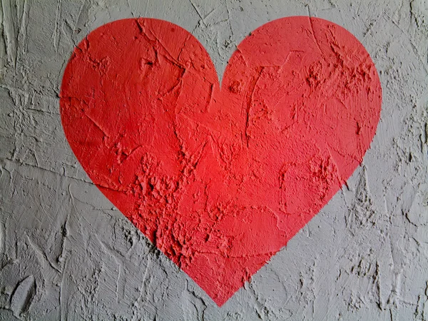 Corazón rojo símbolo pintado en la pared —  Fotos de Stock