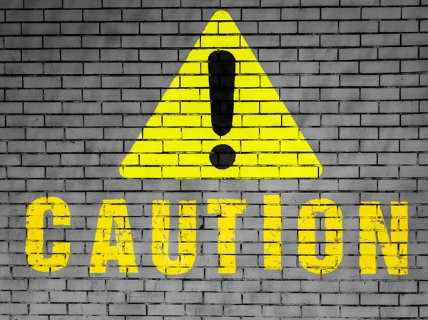 Caution sign painted on — Stock Photo, Image