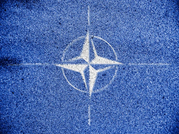 NATO symbol painted on — Stock Photo, Image