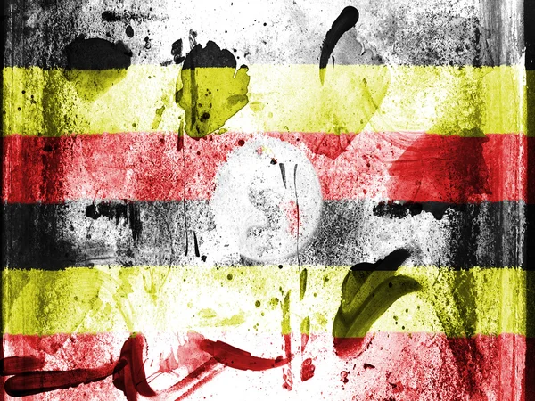 Uganda flagga målade på grunge vägg — Stockfoto