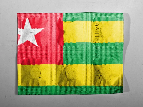 Flaga Togo malowane na tabletki — Zdjęcie stockowe