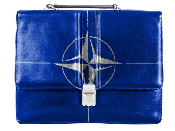 NATO symbol painted on small briefcaseor leather handbag — Stock Photo, Image