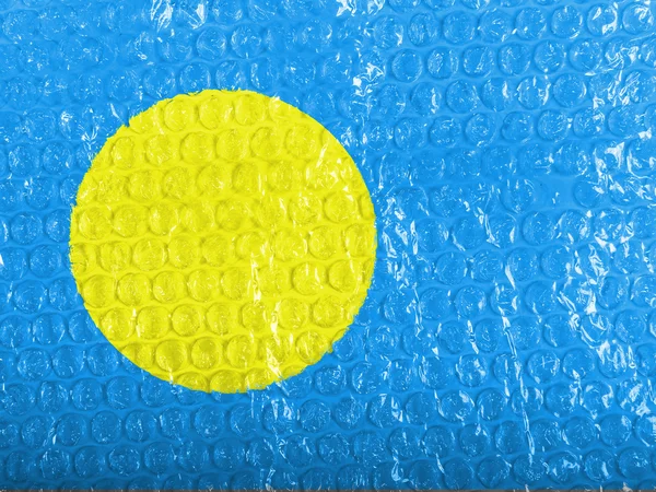 Palau-Flagge auf Blasenfolie gemalt — Stockfoto